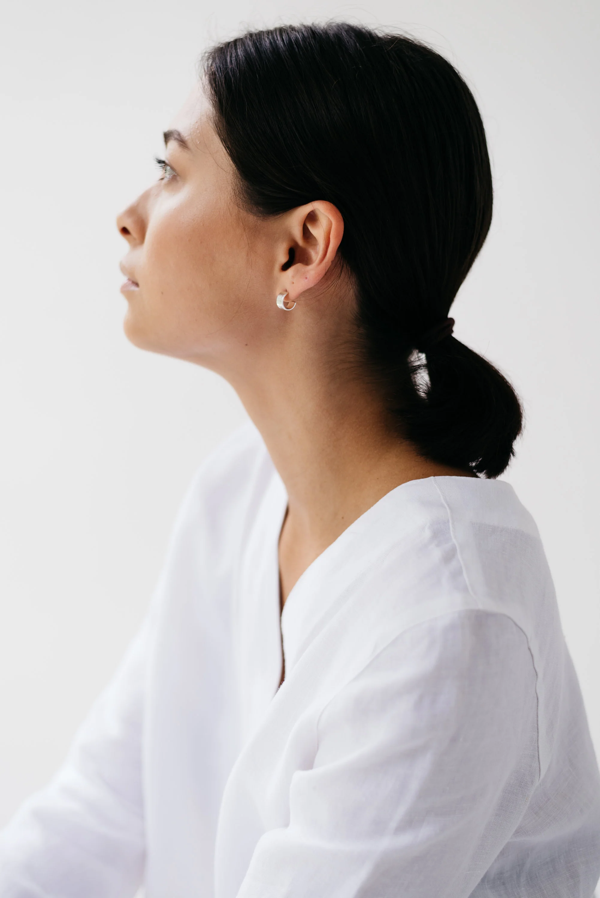 Silver Hammered Huggy Hoops - Image 5
